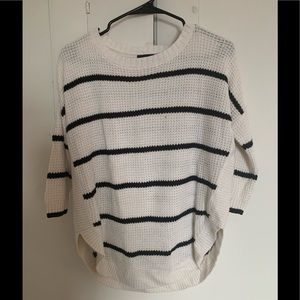 Black and white striped circle hem sweater